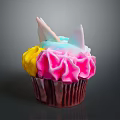 Colorful Unicorn Themed Cupcake With Multicolored Frosting And Decorative Toppings