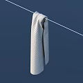 White Towel with Waffle Texture Hanging On Clothesline Against Blue Background for Home Daily Use