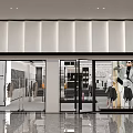 Modern Clothing Store Facade With Glass Doors And Fashionable Mannequins In Window