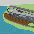 Modern Waterfront Building With Metal Panel Exterior And Glass Facade