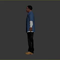 Man Wearing Blue Shirt With White Sleeves Black Pants And Yellow Shoes On Gray Background
