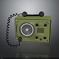 Vintage Green Radio With Classic Dial Knobs Small Speakers And Coiled Cord