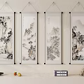 Four Traditional Chinese Landscape Scroll Paintings Hanging on Wall with Small Plant Fruits and Decorations