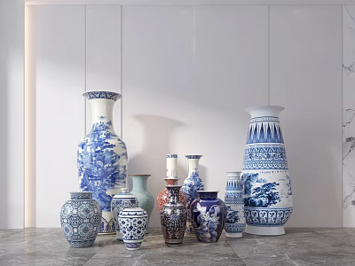 Blue And White Ceramic Vases With Traditional Patterns Displayed On Gray Marble Countertop 3d model