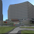 Modern Office Building With Green Roof Surrounding Trees And Commercial Plaza Space