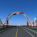 Scenic Modern Arch Bridge With Roadway Spanning Water And Green Surroundings