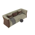 Two Seater Sofa With Beige Velvet Upholstery Brown Quilted Accents Gray Pillows And Throw Blanket
