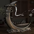 Moon Shaped Ceramic Vessel With Cloud Patterns Flowing Smoke And Bird Figures On Wooden Table