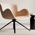 Modern Beige Leather Accent Chair With Black Metal Legs And Side Table On Wooden Floor