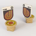Two Numbered Decorative Emblems With Wooden Base And Colorful Spiral Design