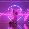 Purple Background Room With Great Family Neon Sign Circular Light Suitcase And White Stool