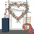 Heart Shaped Floral Art Display With Pink Flowers Greenery Blue Pedestal Lanterns And Wooden Chair