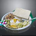 Chicken Shreds Meal With Sandwich Scrambled Eggs Corn And Cabbage On White Plate Green Napkin