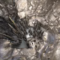Underground Cave Interior With Sharp Stalagmites Water Pool And Rocky Surfaces
