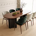 Stylish Oval Wooden Dining Table With Dark Green Light Velvet Chairs Fruits Vase White Wall