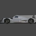 Silver Prototype Racing Car With Streamlined Body Rear Wing And Sporty Design