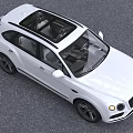 White Bentley Luxury SUV Featuring Elegant Exterior Design And Distinctive Front Grille