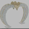Ornamental Golden Heart Arched Structure with Gray Granular Accents and White Base