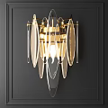Modern Gold Frame Wall Lamp With Transparent Acrylic Shades On Dark Wall And Warm Glow