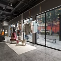 Modern Clothing Store Interior Design With Hanging Clothes Display Racks And Decorative Shelves