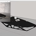 Black Modern Geometric Coffee Table With Sleek Design And Decorative Accent