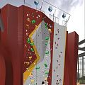 Colorful Holds On Red White Outdoor Climbing Wall Rooftop Structure With Railings