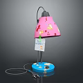 Pink Table Lamp With Cartoon Patterns Blue Base And Price Tag