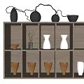 Decorative Vases In Various Colors On Wooden Shelf With Compartments And Dried Branches