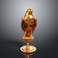 Golden Eagle Statue Beautifully Displayed on Shiny Pedestal Against Black Background