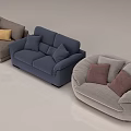 Light Gray Round Single Sofa With Comfortable Pillows On Light Colored Floor 3d model