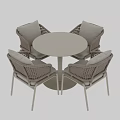 Modern White Wicker Table And Chair Set With Round Table And Four Cushioned Chairs