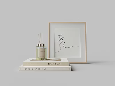 Stack of Art Books With Minimalist Line Drawing Frame And Reed Diffuser 3d model