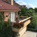 Red Brick Building Exterior Wall with Stone Details Green Plants and Balcony in Villa Area