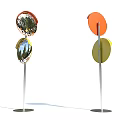 Standing Circular Decorative Pieces With Metal Pole Base And Orange Yellow Reflective Panels