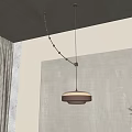 Modern Circular Pendant Light Hanging From Gray Ceiling With White Wall Curtain And Green Plant