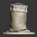 Burlap Bag Filled With Coffee Beans On Round Wooden Disc