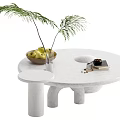 Modern Round White Marble Coffee Table With Green Plant Fruit Bowl And Book