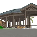 Traditional Open Wooden Pavilion Featuring Green Tiled Roof And Stone Surroundings