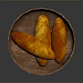 Three Golden Brown Roasted Sweet Potatoes in Wooden Plate on Dark Background