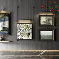 Artistic Abstract Paintings Framed on Modern Dark Wall with Decorative Plant