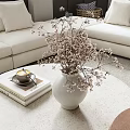 Stylish Floral Arrangement with Dried Flowers in White Vase on Modern Living Room Coffee Table