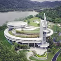 Modern Circular Cultural Center Building With Green Roof Surrounded by Lake and Mountains 3d model