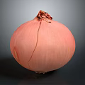 Fresh Pink Onion With Cracked Skin On Dark Background Close Up View