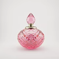 Pink Crystal Cut Perfume Bottle With Metallic Accent And Decorative Stopper