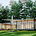 Modern Single Family House With Large Glass Windows Surrounded by Green Trees and Lawn