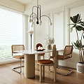 Elegant Dining Table Set With Marble Top Rattan Chairs Leather Seats And Chandelier