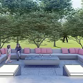 Comfortable Outdoor Sofa With Pink Cushions In Patio Area With Trees And Green Grass