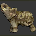 Decorative Gold And White Elephant Figurine With Ornate Design Details