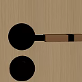 Golden Door Handle With Wooden Grip And Matching Lock On Wooden Door