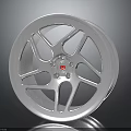 Stylish Car Wheel With Silver Spoke Design And Red Center Logo